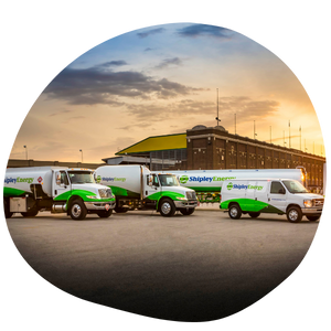 Shipley Energy trucks and van in a parking lot during a sunset (1)